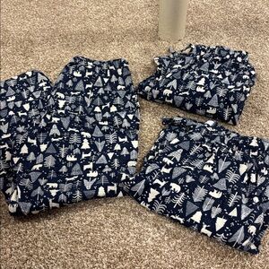 Three pairs of Old Navy men’s holiday pajama pants